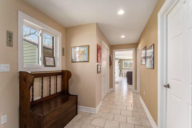 9701 Kruger Rd, Union Pier, MI 49129 - hallway featuring baseboards, light tile patterned flooring, and recessed lighting