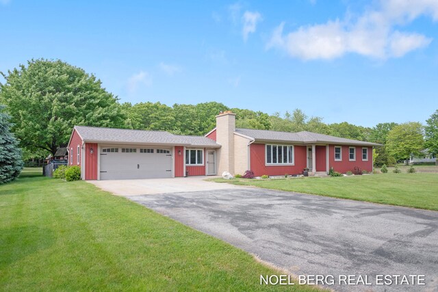 16507 Sleeper St, Grand Haven, MI 49417 - ranch-style house featuring driveway, an attached garage, a chimney, and a front lawn