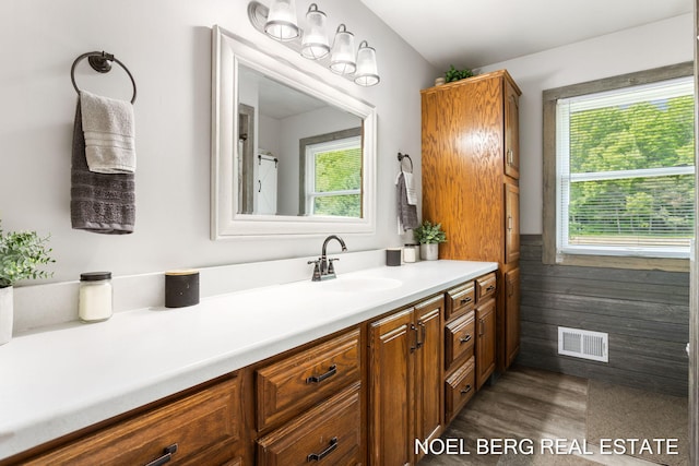 16507 Sleeper St, Grand Haven, MI 49417 - full bath with vanity and wood finished floors