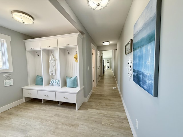 3633 Marina View Pt, Muskegon, MI 49441 - mudroom featuring baseboards and light wood finished floors