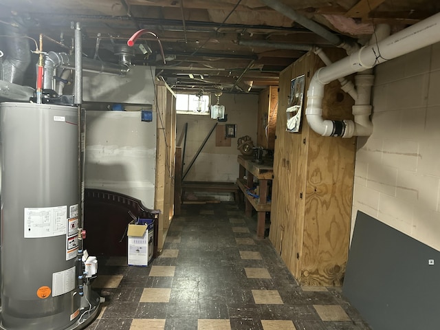 1283 Vesta Rd, Muskegon, MI 49445 - below grade area featuring gas water heater and tile patterned floors
