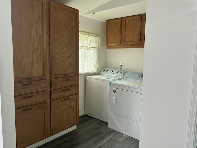 1283 Vesta Rd, Muskegon, MI 49445 - washroom with washing machine and dryer, dark wood-style floors, and cabinet space