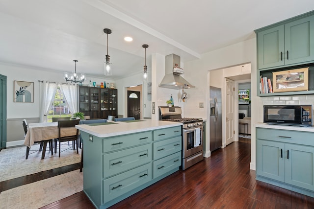 770 Bloomfield Blvd, Jackson, MI 49203 - kitchen with stainless steel appliances, green cabinetry, a chandelier, island range hood, and tasteful backsplash