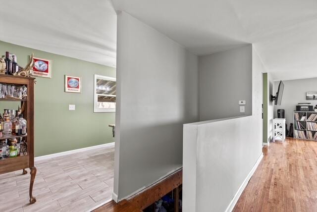 507 E 4th St, Hersey, MI 49639 - corridor with wood finished floors and baseboards