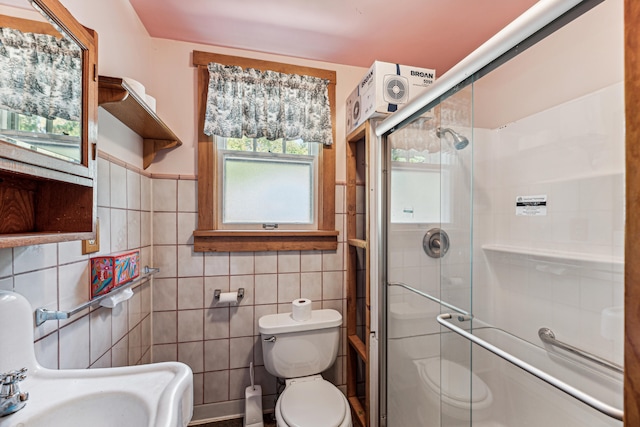 8661 Elm Valley Rd, Union Pier, MI 49129 - full bath featuring tile walls, toilet, and a stall shower