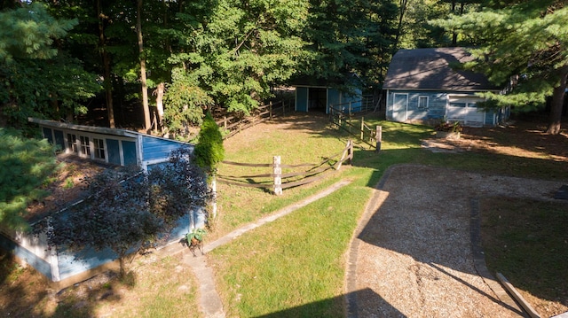 8661 Elm Valley Rd, Union Pier, MI 49129 - view of yard with an outbuilding