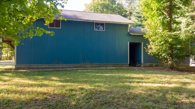 8661 Elm Valley Rd, Union Pier, MI 49129 - view of home's exterior with a yard