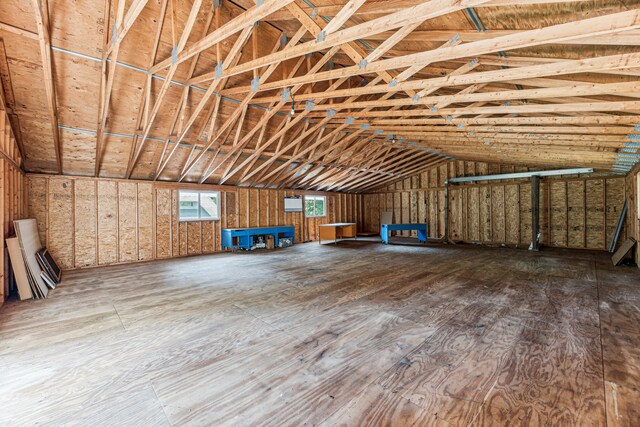 8661 Elm Valley Rd, Union Pier, MI 49129 - miscellaneous room featuring lofted ceiling
