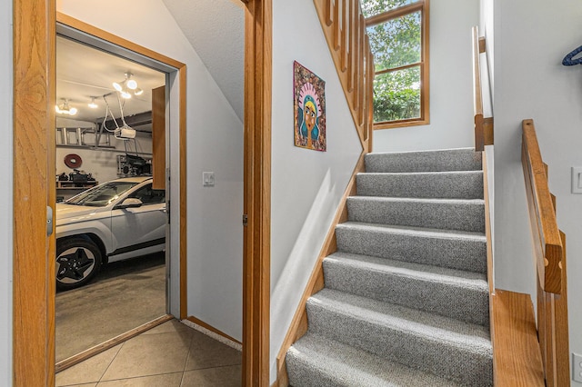 4223 Spring Lake Blvd, Ann Arbor, MI 48108 - stairway with tile patterned floors and baseboards
