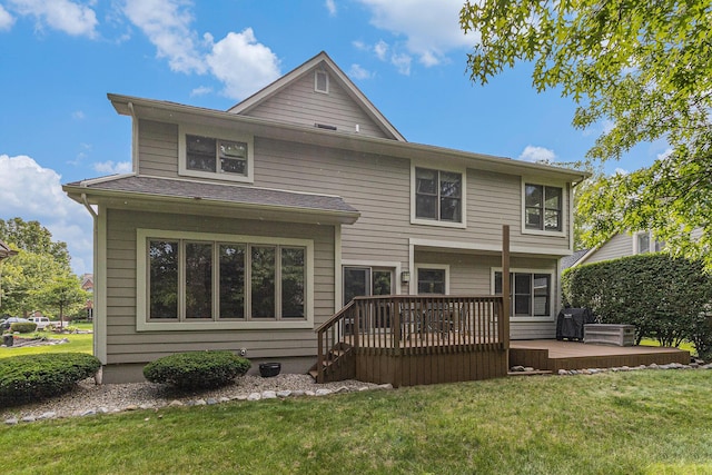 4223 Spring Lake Blvd, Ann Arbor, MI 48108 - back of property with a deck and a lawn