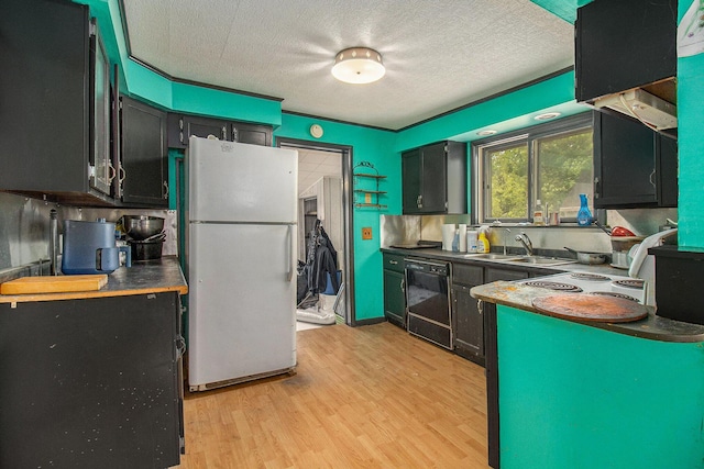 302 Wood St, Hart, MI 49420 - kitchen with freestanding refrigerator, dishwasher, a textured ceiling, light wood-type flooring, and dark countertops