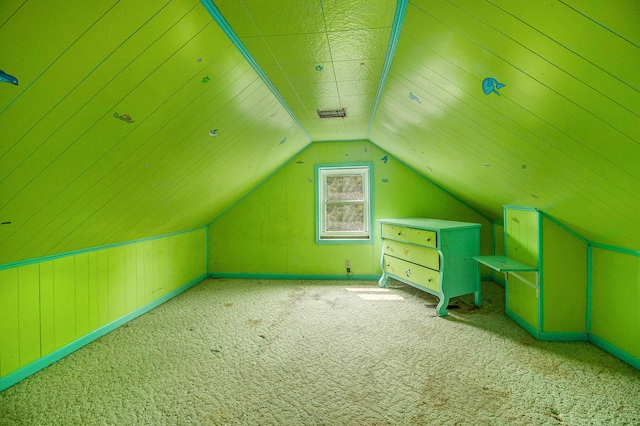 302 Wood St, Hart, MI 49420 - additional living space featuring carpet, vaulted ceiling, and baseboards