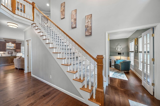 33081 Old Post Rd, Niles, MI 49120 - staircase featuring ornamental molding, hardwood / wood-style floors, baseboards, french doors, and recessed lighting