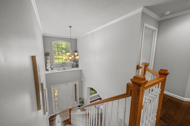 33081 Old Post Rd, Niles, MI 49120 - entryway featuring dark wood-style floors, a chandelier, crown molding, and baseboards