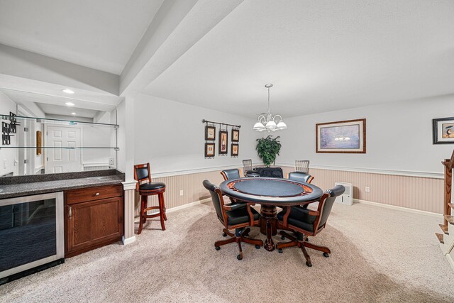 33081 Old Post Rd, Niles, MI 49120 - dining area featuring wine cooler, a wainscoted wall, light colored carpet, bar area, and recessed lighting