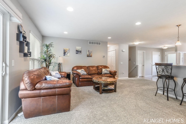 926 N Sandalwood Cir, Muskegon, MI 49441 - living room featuring light colored carpet, recessed lighting, and baseboards