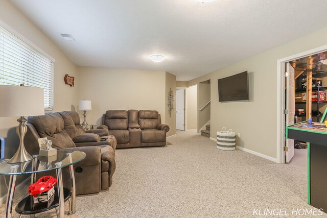 926 N Sandalwood Cir, Muskegon, MI 49441 - living room featuring carpet floors, stairs, and baseboards