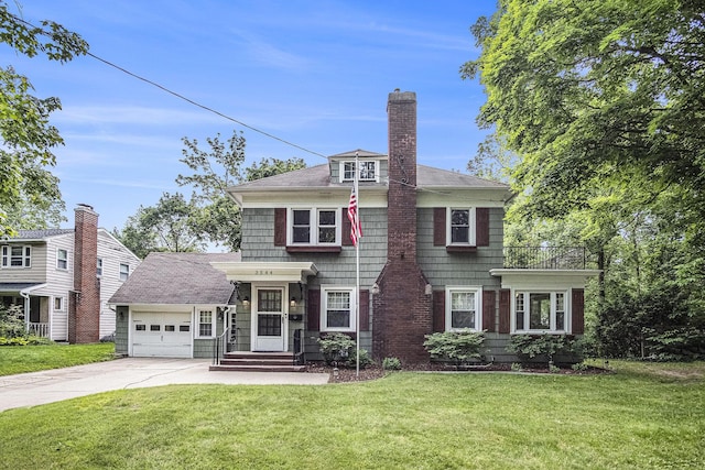 3544 Briggs Blvd NE, Grand Rapids, MI 49525 - traditional style home with concrete driveway, a front lawn, a chimney, and an attached garage