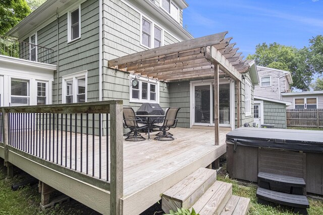 3544 Briggs Blvd NE, Grand Rapids, MI 49525 - wooden terrace with a hot tub, a pergola, and outdoor dining area