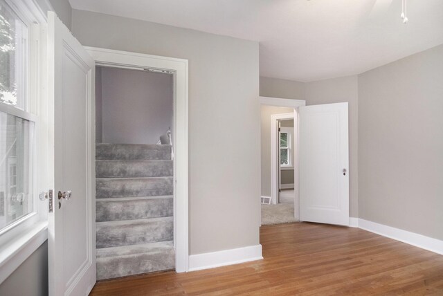 3544 Briggs Blvd NE, Grand Rapids, MI 49525 - stairs featuring wood finished floors and baseboards