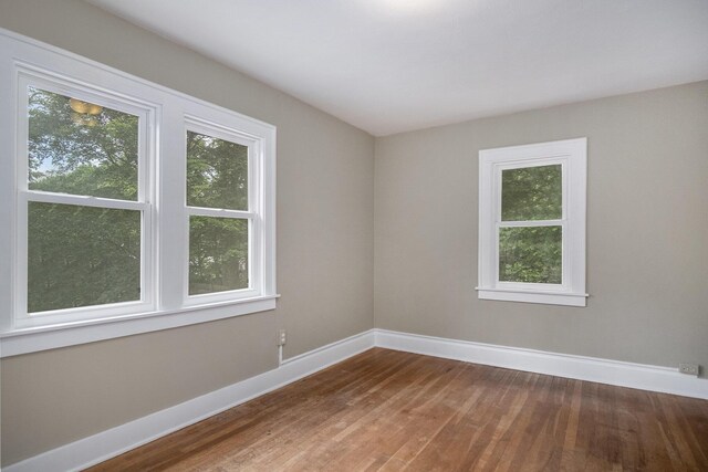 3544 Briggs Blvd NE, Grand Rapids, MI 49525 - empty room featuring baseboards and wood finished floors