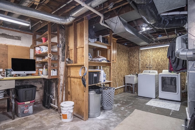 3544 Briggs Blvd NE, Grand Rapids, MI 49525 - unfinished below grade area featuring washing machine and clothes dryer and a sink