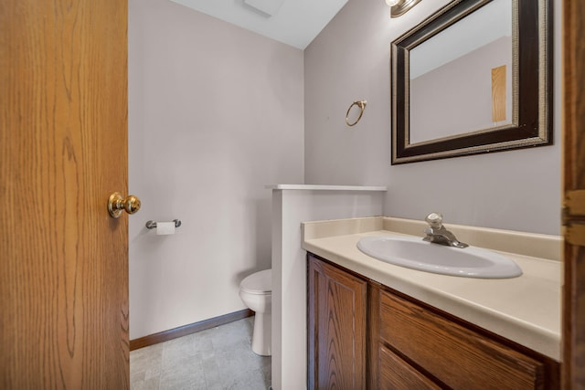 2045 E Baldwin Rd, Grand Blanc, MI 48439 - half bathroom featuring toilet, vanity, and baseboards
