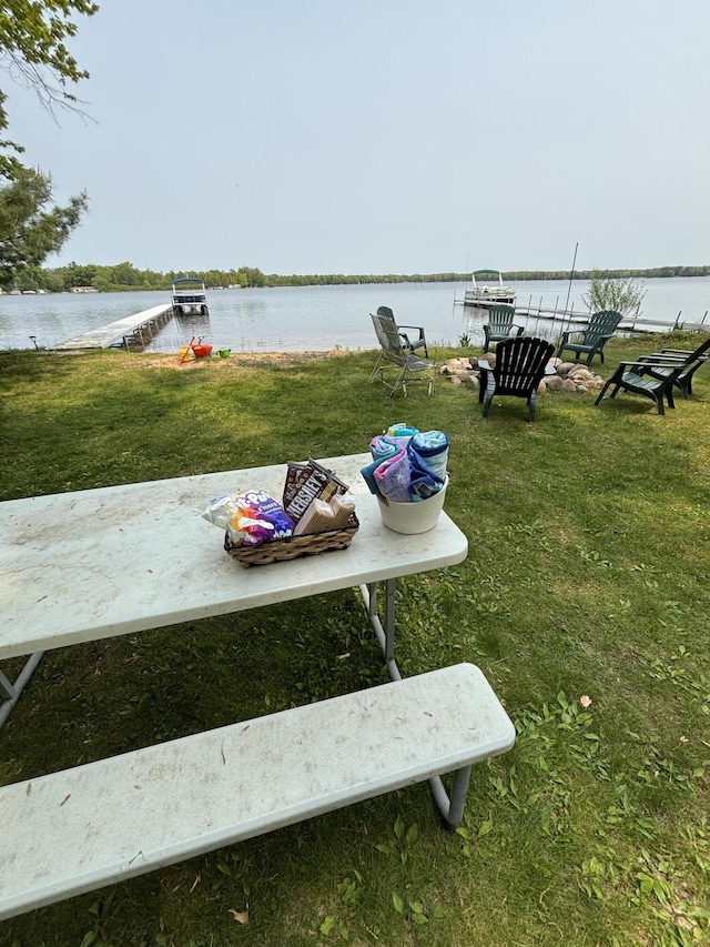 1142 Wolf Lake Dr, Baldwin, MI 49304 - view of grassy yard with a water view