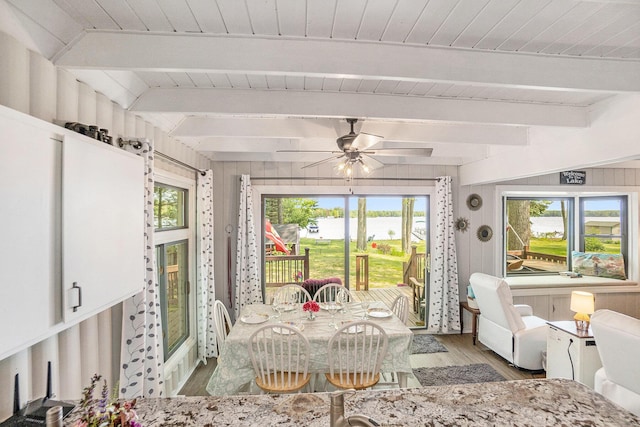 1142 Wolf Lake Dr, Baldwin, MI 49304 - sunroom with plenty of natural light and beamed ceiling