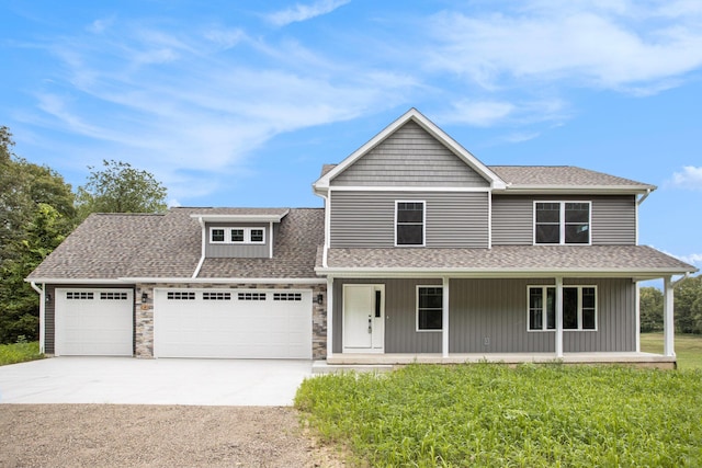 2141 N 35th St, Galesburg, MI 49053 - view of front of house featuring driveway, a garage, covered porch, and roof with shingles