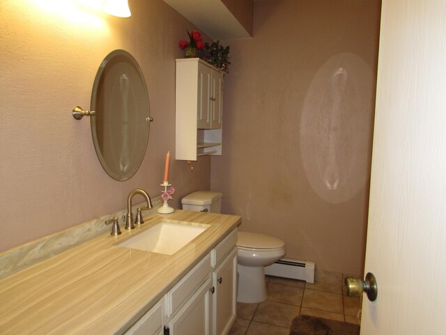 9920 Cambridge Ct, South Lyon, MI 48178 - bathroom with a baseboard radiator, toilet, tile patterned floors, and vanity