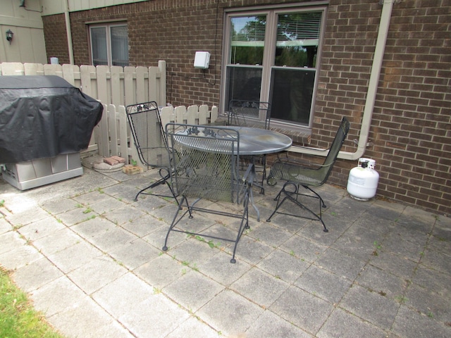 9920 Cambridge Ct, South Lyon, MI 48178 - view of patio / terrace with outdoor dining space and grilling area
