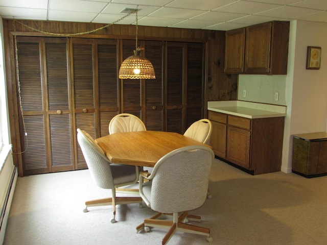 9920 Cambridge Ct, South Lyon, MI 48178 - dining space featuring a drop ceiling and light carpet