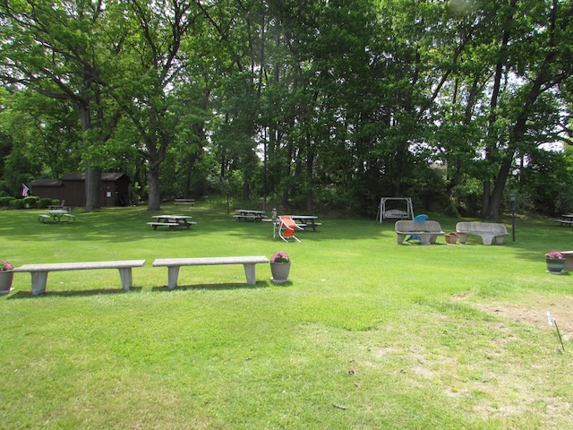 9920 Cambridge Ct, South Lyon, MI 48178 - view of property's community with a yard