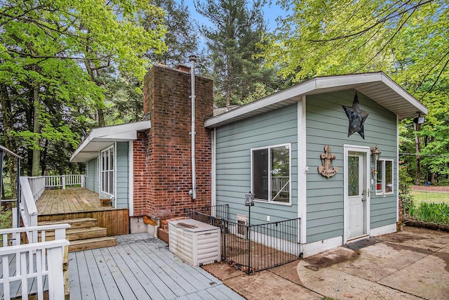 4468 Teal Ln, Newaygo, MI 49337 - wooden deck featuring a patio area