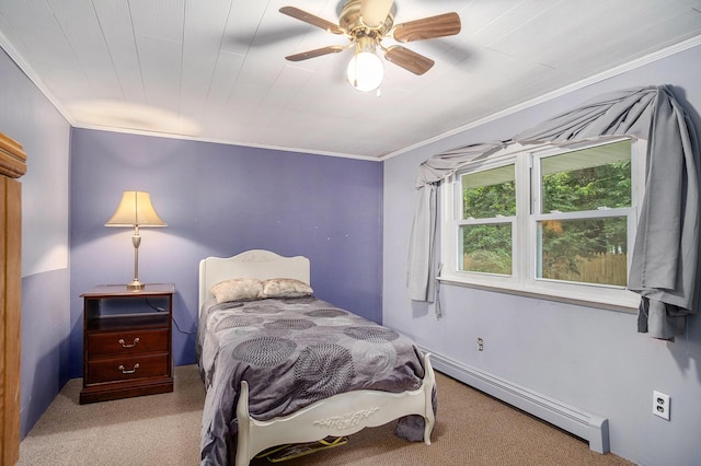 4468 Teal Ln, Newaygo, MI 49337 - carpeted bedroom featuring a baseboard radiator, crown molding, and ceiling fan