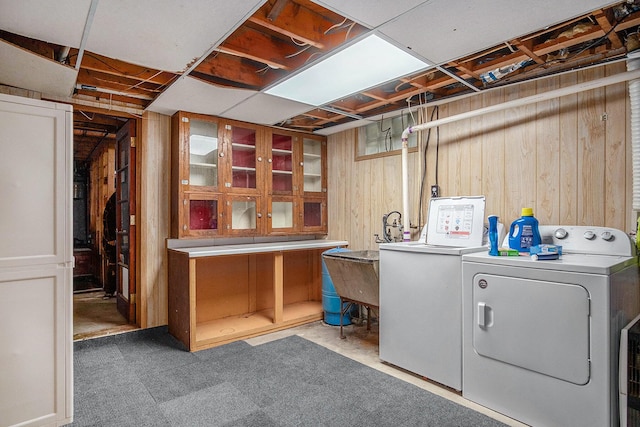 4468 Teal Ln, Newaygo, MI 49337 - laundry room with washing machine and dryer and wood walls