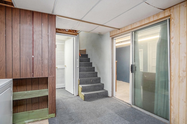 4468 Teal Ln, Newaygo, MI 49337 - stairs with carpet, washer / dryer, and wooden walls