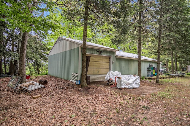 4468 Teal Ln, Newaygo, MI 49337 - view of side of property featuring a garage and an outdoor structure