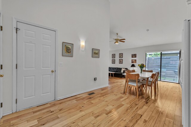 2539 Country Village Ct, Ann Arbor, MI 48103 - dining space featuring light wood-style flooring, ceiling fan, and high vaulted ceiling