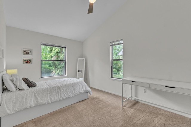 2539 Country Village Ct, Ann Arbor, MI 48103 - bedroom featuring multiple windows, light colored carpet, lofted ceiling, a ceiling fan, and baseboards