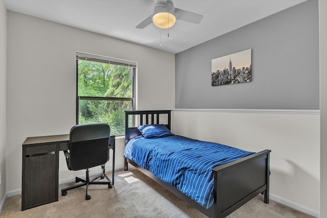 2539 Country Village Ct, Ann Arbor, MI 48103 - carpeted bedroom with baseboards, an office area, and a ceiling fan