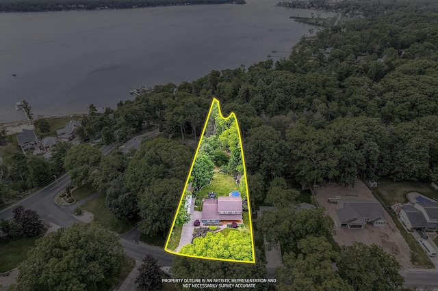 4744 Sandy Ln, Whitehall, MI 49461 - view of property location featuring property parcel outlined, a large body of water, and a heavily wooded area