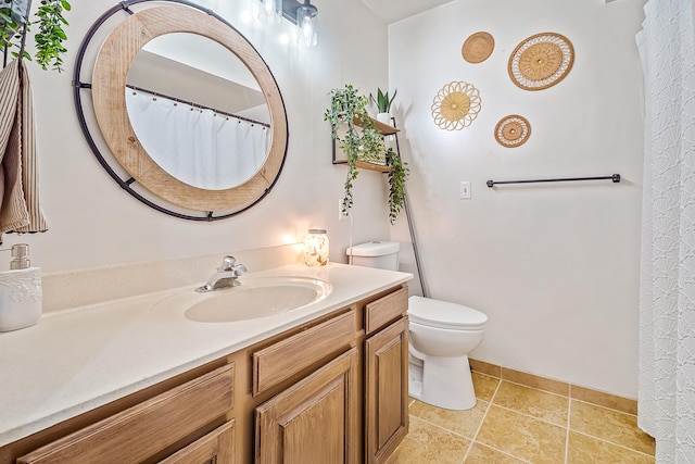 4744 Sandy Ln, Whitehall, MI 49461 - full bathroom with vanity, toilet, and baseboards