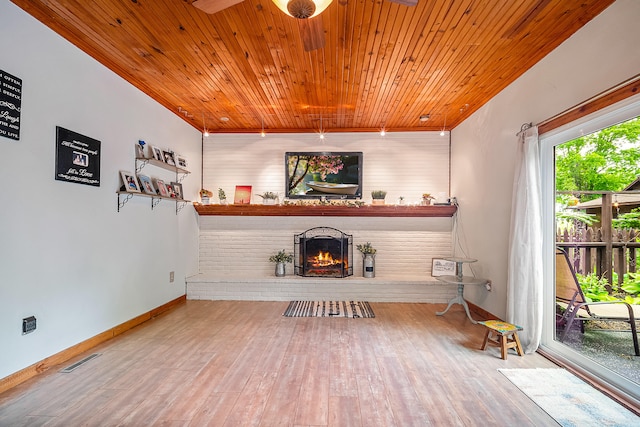 4744 Sandy Ln, Whitehall, MI 49461 - living room featuring wooden ceiling, a brick fireplace, wood finished floors, baseboards, and ceiling fan