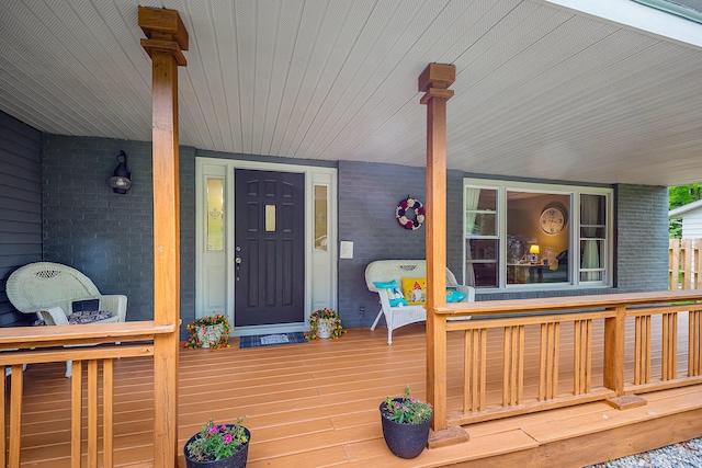 4744 Sandy Ln, Whitehall, MI 49461 - entrance to property featuring covered porch and brick siding