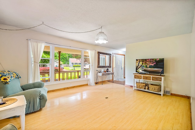 4744 Sandy Ln, Whitehall, MI 49461 - sitting room featuring wood finished floors and baseboards