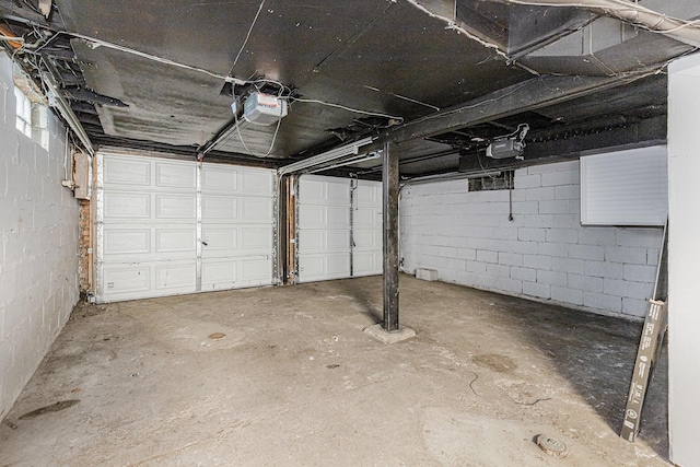 1335 Knapp St NE, Grand Rapids, MI 49505 - garage with a garage door opener and concrete block wall
