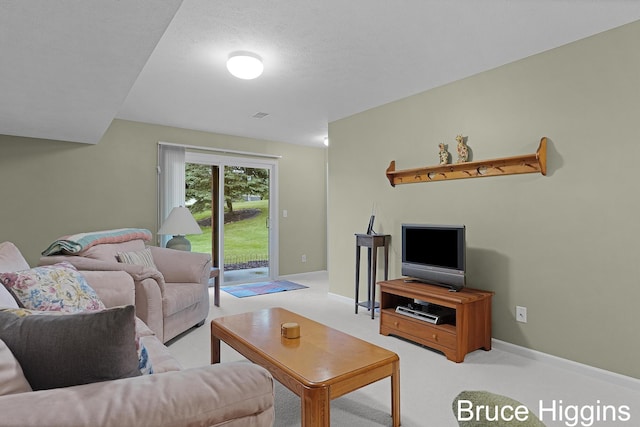 614 Oriole Ct Unit 7, Middleville, MI 49333 - carpeted living area featuring baseboards