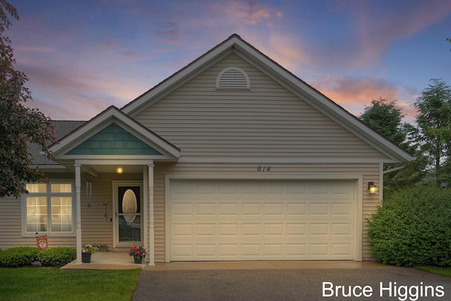 614 Oriole Ct Unit 7, Middleville, MI 49333 - view of front of property featuring asphalt driveway and an attached garage